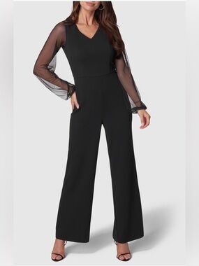 Bebe Black Mesh Sheer Long Sleeve Jumpsuit. Brand new